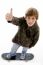 Boy Riding Skateboard And Showing Thumbs Up