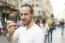 Man Taking Photo With Mobile Phone