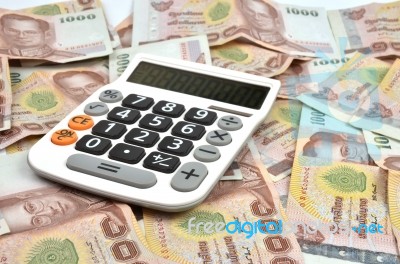 1000 Baht Banknotes And Calculator  Stock Photo
