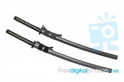 2 Japanese Swords And Scabbard With Black And Two-tone Cord Isolated In White Background Stock Photo