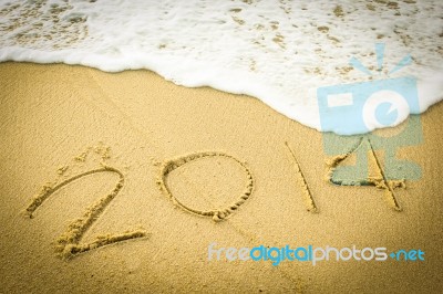2014 Text Written On The Beach Stock Photo