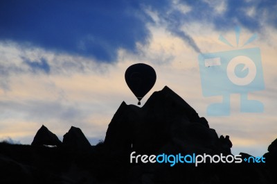 A Balloon Among The Valley At Cappadocia, Turkey Stock Photo