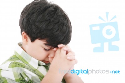 A Boys Praying Stock Photo