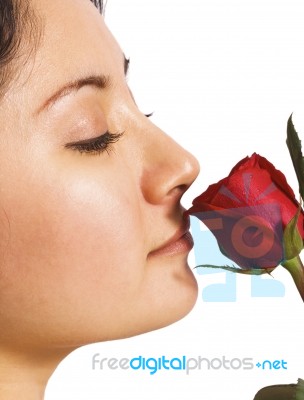 A Girl Smelling A Rose Stock Photo A Girl Smelling A Rose Stock Photo