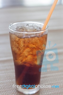 A Glass Of Cola With Ice Stock Photo