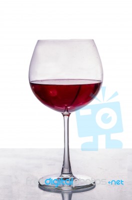 A Glass Of Red Wine Isolated On White Background Stock Photo
