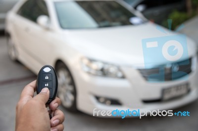A Hand Press Button Of Remote Control Car Key To Opens A Car Doo… Stock Photo