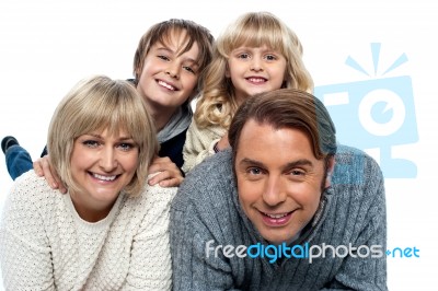 A Happy Family On White Background Stock Photo