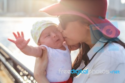 A Kiss From Mom Stock Photo