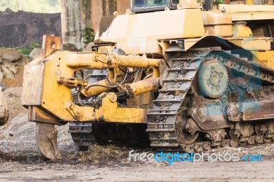 A Large  Bulldozer In Construction Site Stock Photo