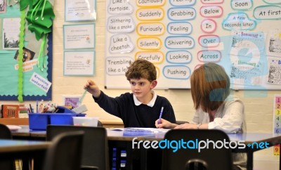 A Schoolboy And His Teacher Stock Photo