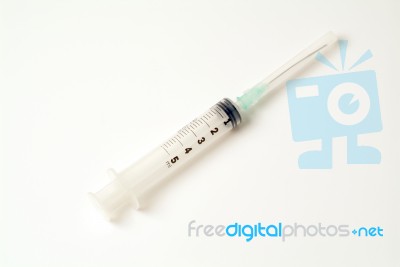 A Syringe Isolated  Stock Photo