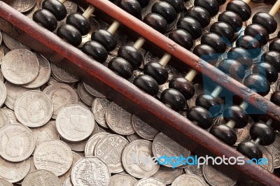 Abacus On Money Stock Photo