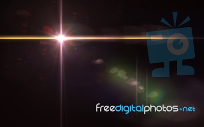 Abstract Image Of Sun Burst Lighting Flare.beautiful Digital Lens Flare In Black Background Horizontal Frame Warm Stock Image