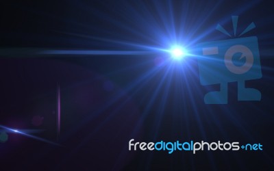 Abstract Lens Flare Light Over Black Background Stock Image