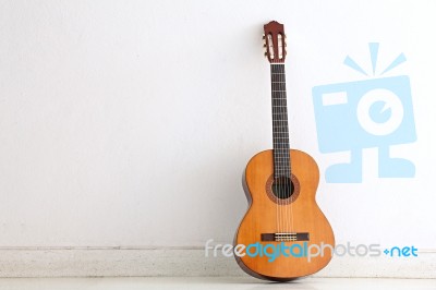 Acoustic Guitar Wall Stock Photo