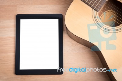 Acoustic Guitar With Digital Tablet Stock Photo