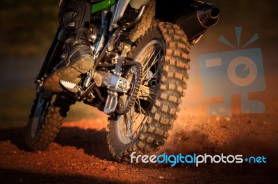 Action Of Enduro Motorcycle On Dirt Track Stock Photo