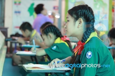 Activity Of Teaching Elementary Students. Elementary Students Are Test Lesson. The Students Intend Exam Stock Photo