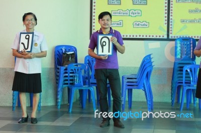 Activity Of Teaching Elementary Students. Elementary Students Are Test Lesson. The Students Intend Exam Stock Photo