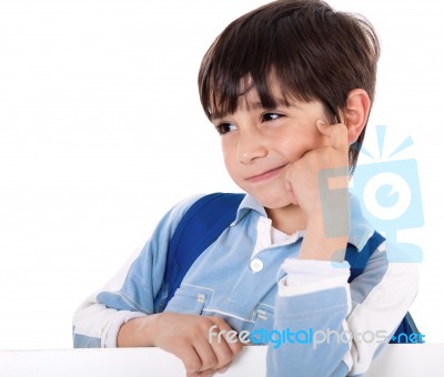 Adorable School Boy Thinking Stock Photo