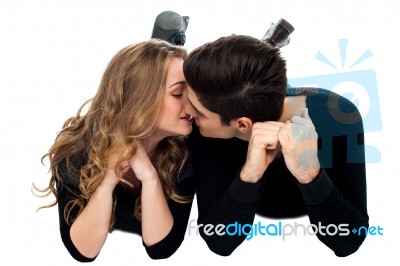 Adorable Young Couple Kissing Stock Photo