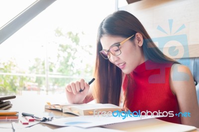 Adult Young Pretty Business Woman Working At Her Office. She Is Stock Photo