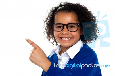 African Primary Girl Showing The Way To Her Classroom Stock Photo