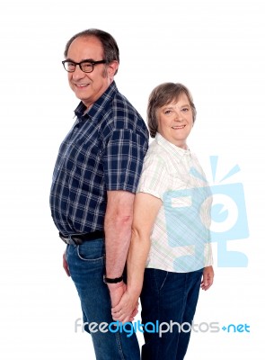 Aged Couple Posing Back To Back Stock Photo Aged Couple Posing Back To Back Stock Photo
