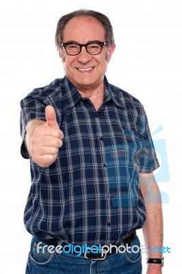 Aged Man Gesturing Thumbs Up Stock Photo