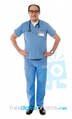 Aged Medical Professional Standing Stock Photo