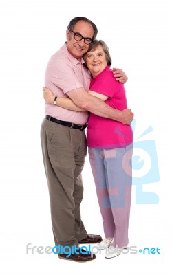 Aged Woman Hugging Her Husband Stock Photo