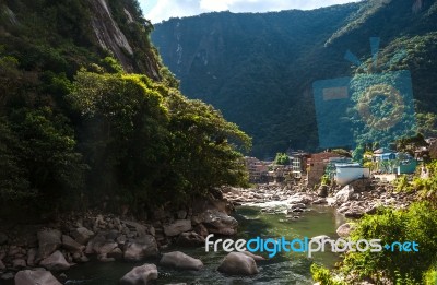 Aguas Calientes, The Town And Railway Station At The Foot Of The… Stock Photo