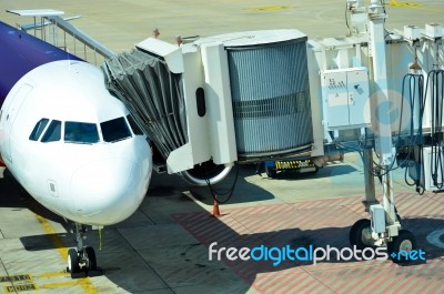 Aircraft Parked In The Airport Stock Photo