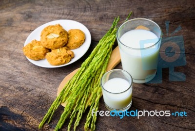Almond Cookies With Rice Milk And Ear Of Rice  On Old Wooden Tab… Stock Photo
