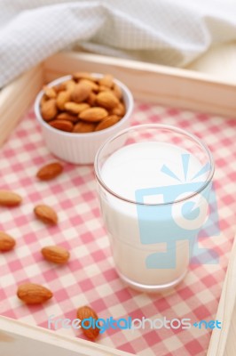 Almond Milk In Glass Stock Photo