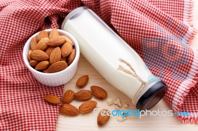 Almond Milk On Wood Table Stock Photo