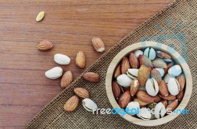 Almonds In Bowls On Sacks Stock Photo