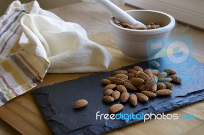 Almonds With Mortar & Pestle Stock Photo