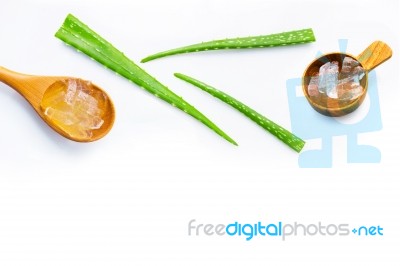 Aloe Vera Fresh Leaves With Aloe Vera Gel On Wooden Spoon Stock Photo