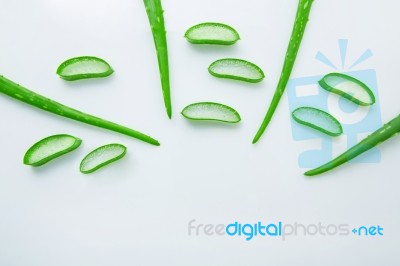 Aloe Vera Fresh Leaves With Slices Aloe Vera Gel On Wooden Spoon… Stock Photo Aloe Vera Fresh Leaves With Slices Aloe Vera Gel On Wooden Spoon… Stock Photo