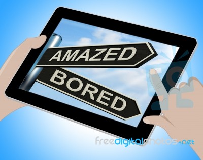 Amazed Bored Tablet Shows Dull And Amazing Stock Image