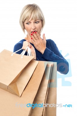 Amazed Shopping Woman Isolated On White Stock Photo