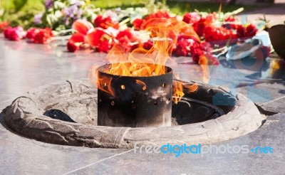 An Eternal Flame Burns At The Monument Stock Photo