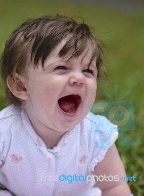 An Extremely Happy Infant Stock Photo