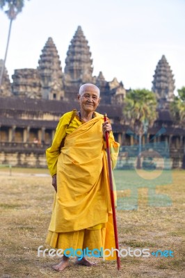 An Unidentified Old Buddhist Female Monk Dressed In Orange Toga Stock Photo An Unidentified Old Buddhist Female Monk Dressed In Orange Toga Stock Photo