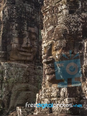 Ancient Stone Face Of Bayon Temple Stock Photo