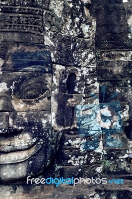 Ancient Stone Faces Of Bayon Temple, Angkor Wat, Siam Reap, Cambodia Stock Photo