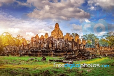 Ancient Stone Faces Of Bayon Temple, Angkor Wat, Siam Reap, Cambodia Stock Photo