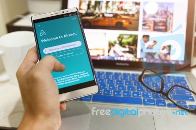 Android Device Showing Airbnb Application On The Screen Stock Photo